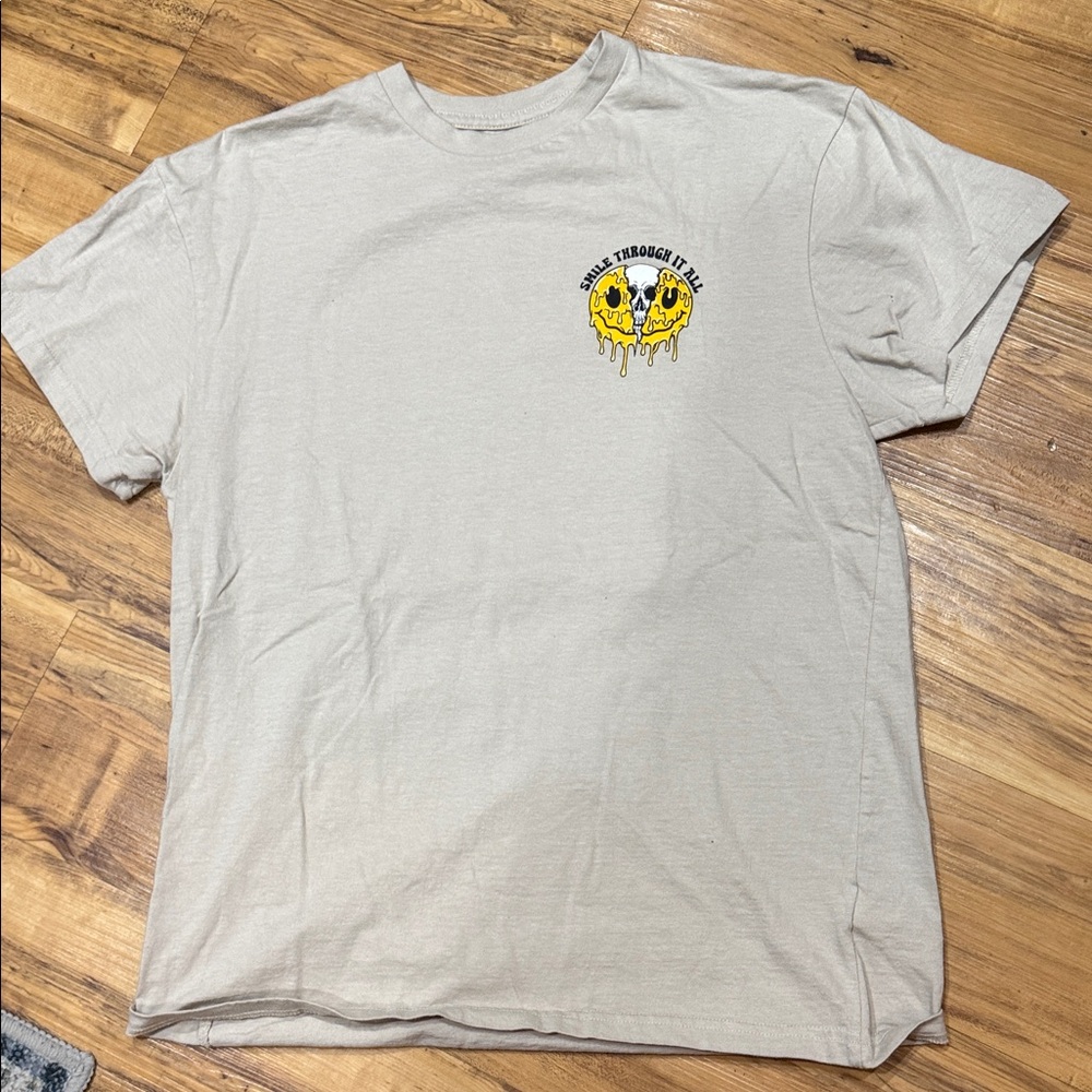 Retrofit Beige Tee with Yellow Skull Design